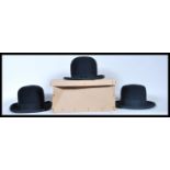 A group of three vintage 20th Century black moleskin bowler hats made by Griffson, Borsalino and