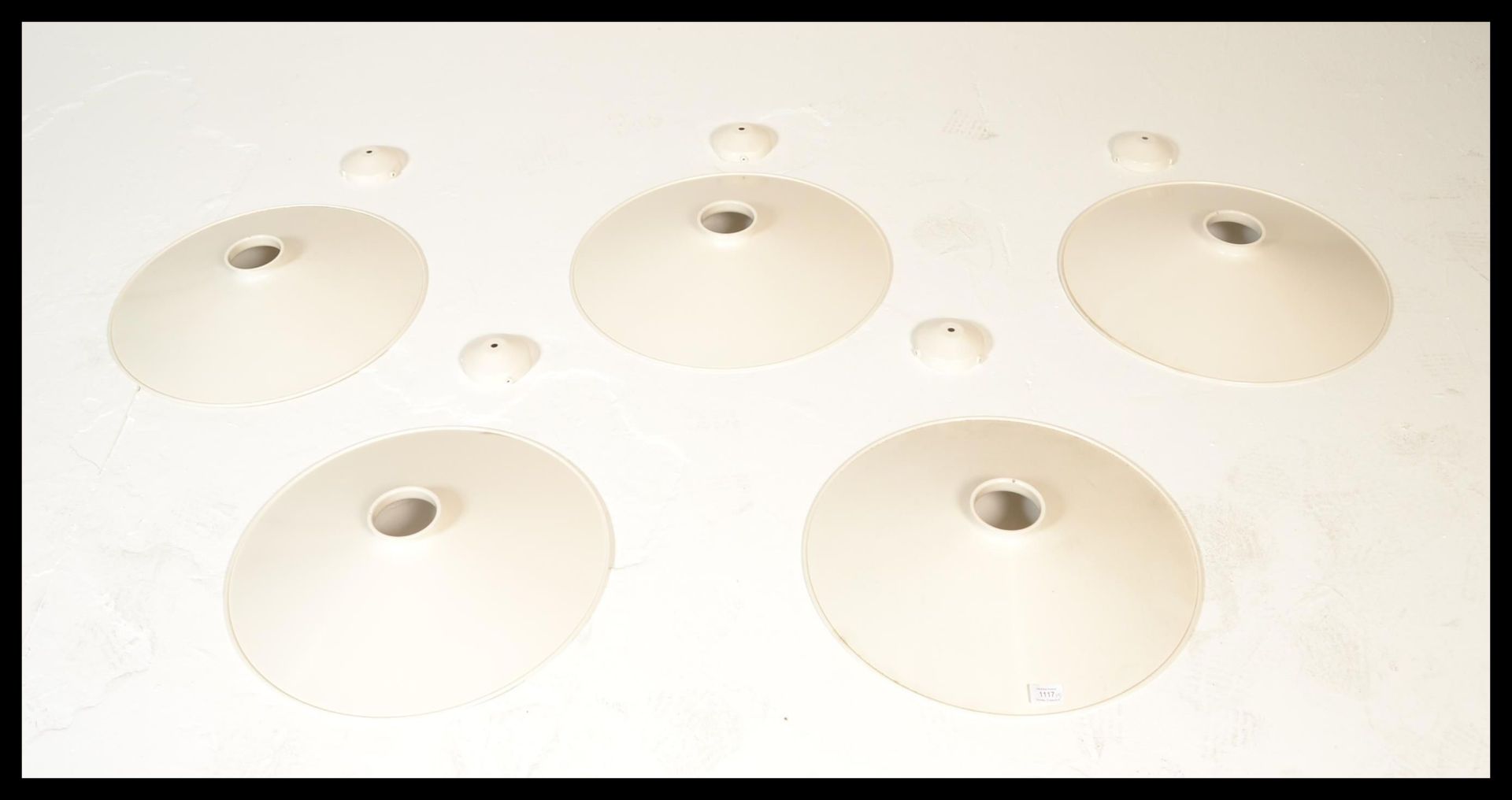 A group of five retro industrial factory style UFO form lampshades having white enamelled finish. - Image 2 of 3