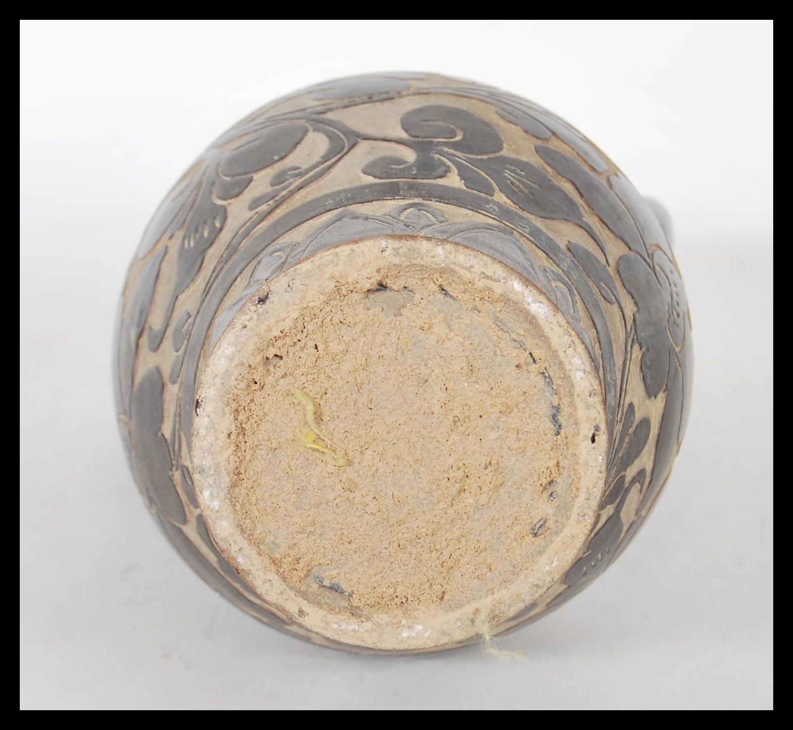 A Chinese stoneware vase / urn having shaped twin handles with floral relief decoration to the - Image 6 of 6