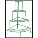 A mid 20th Century 1950's weathered green painted light steel quarter size florist plant stand