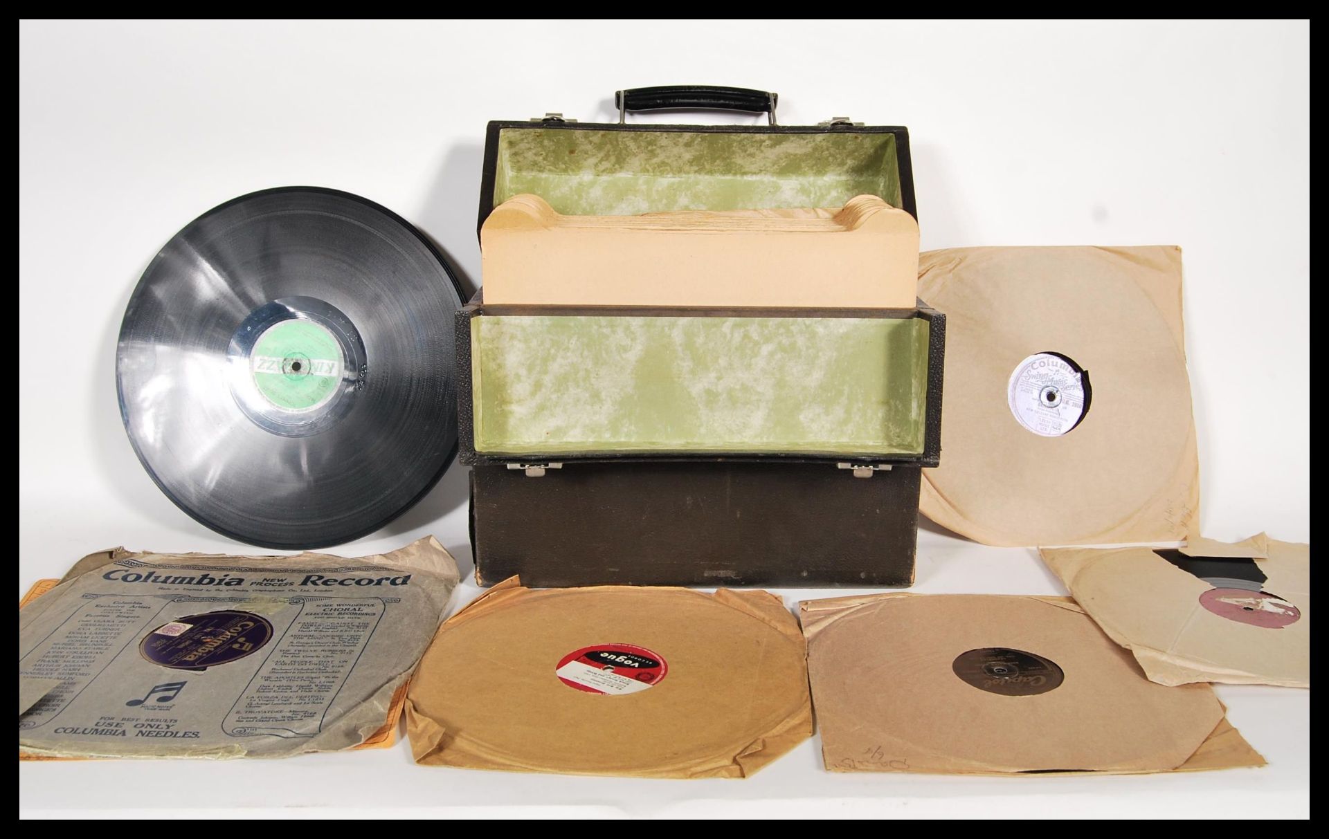 A collection 0f cased Jazz and Blues 78 RPM records to include, Louis Armstrong Gatemouth and