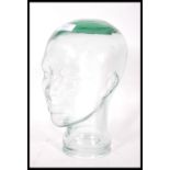 A vintage retro 20th century advertising shop display glass phrenology type head of clear glass