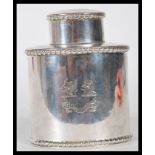 A 19th Century Victorian silver hallmarked tea caddy having gadrooned bordered having engraved