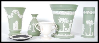 A collection of Wedgwood dating from the 19th Century to include a Victorian twin handled unglazed