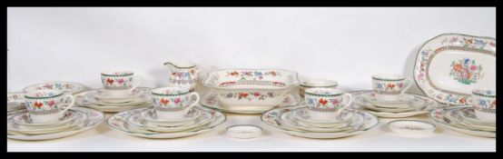 A 20th century Spode ceramic dinner service in the ' Indian  Tree ' pattern. Comprising dinner