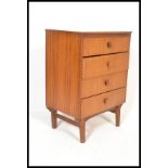 A 1970's Danish inspired teak wood pedestal chest of drawers by Remploy. Raised on tapering legs