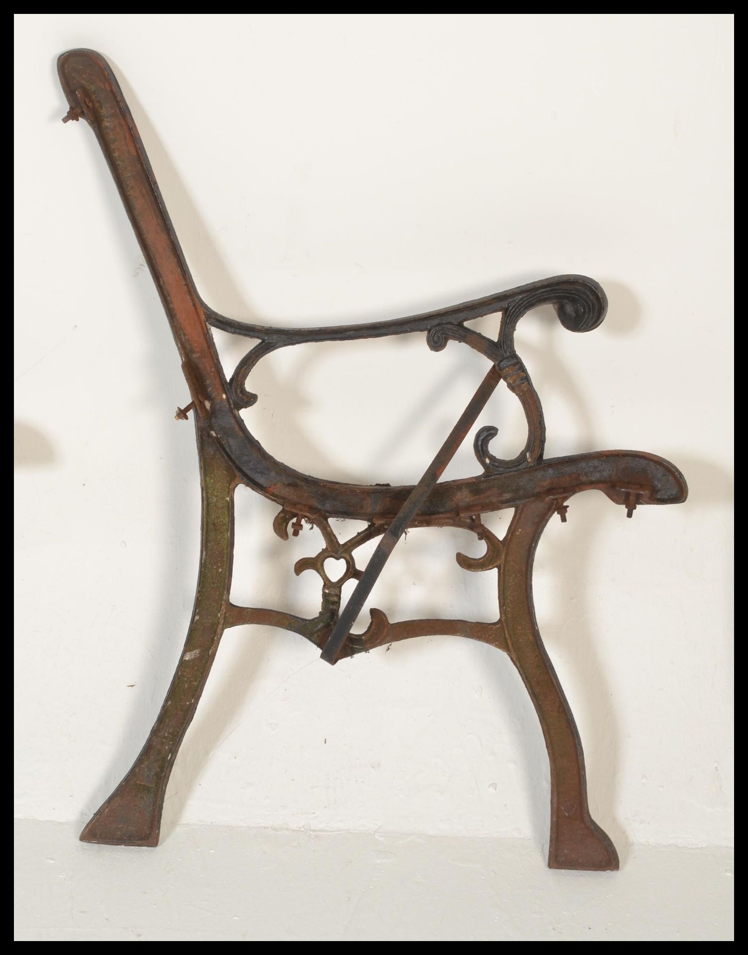 A pair of early 20th Century cast iron bench end finished in black. Together with a decorative - Bild 3 aus 7