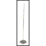 A mid 20th century Art Deco floor standing lamp, having square base and chrome finish. Measures