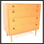 A retro 20th century Avalon teak wood chest of drawers, having a configuration of four graduating