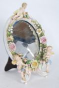 A 19th Century style porcelain easel back mirror,
