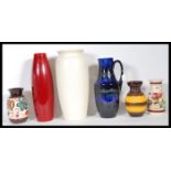 A collection of 20th Century studio pottery vases to include West Germany Fat Lava vase/ jug 407-35,