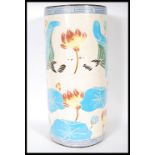 A 20th Century 1930's Art Deco Oriental ceramic cylindrical stick stand having lotus flowers, blue