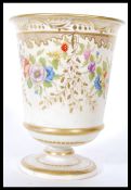 A 19th Century French Sevres ceramic goblet having hand painted floral sprays coloured in pinks