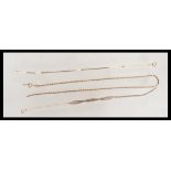 A selection of three 9ct gold jewellery items to include, a snake chain necklace having spring clasp