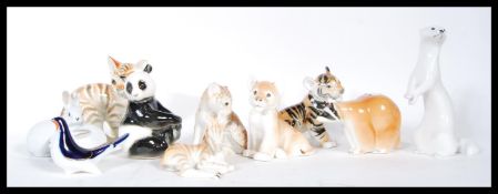 A collection of eleven vintage Russian USSR Lomonosov ceramic figurines of animals to include