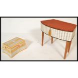 Two vintage retro 20th Century woven sewing work boxes to include a white and yellow box with a