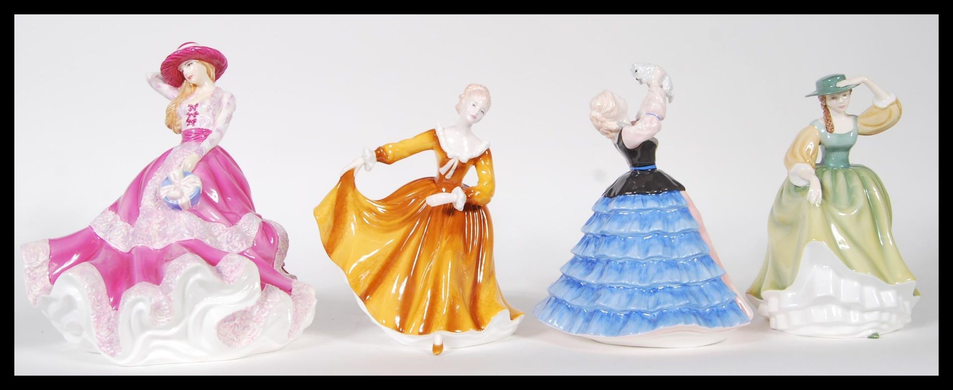 A selection of of four Royal Doulton ' Pretty Ladies ' to include ' Just For You ' HN 5140, '