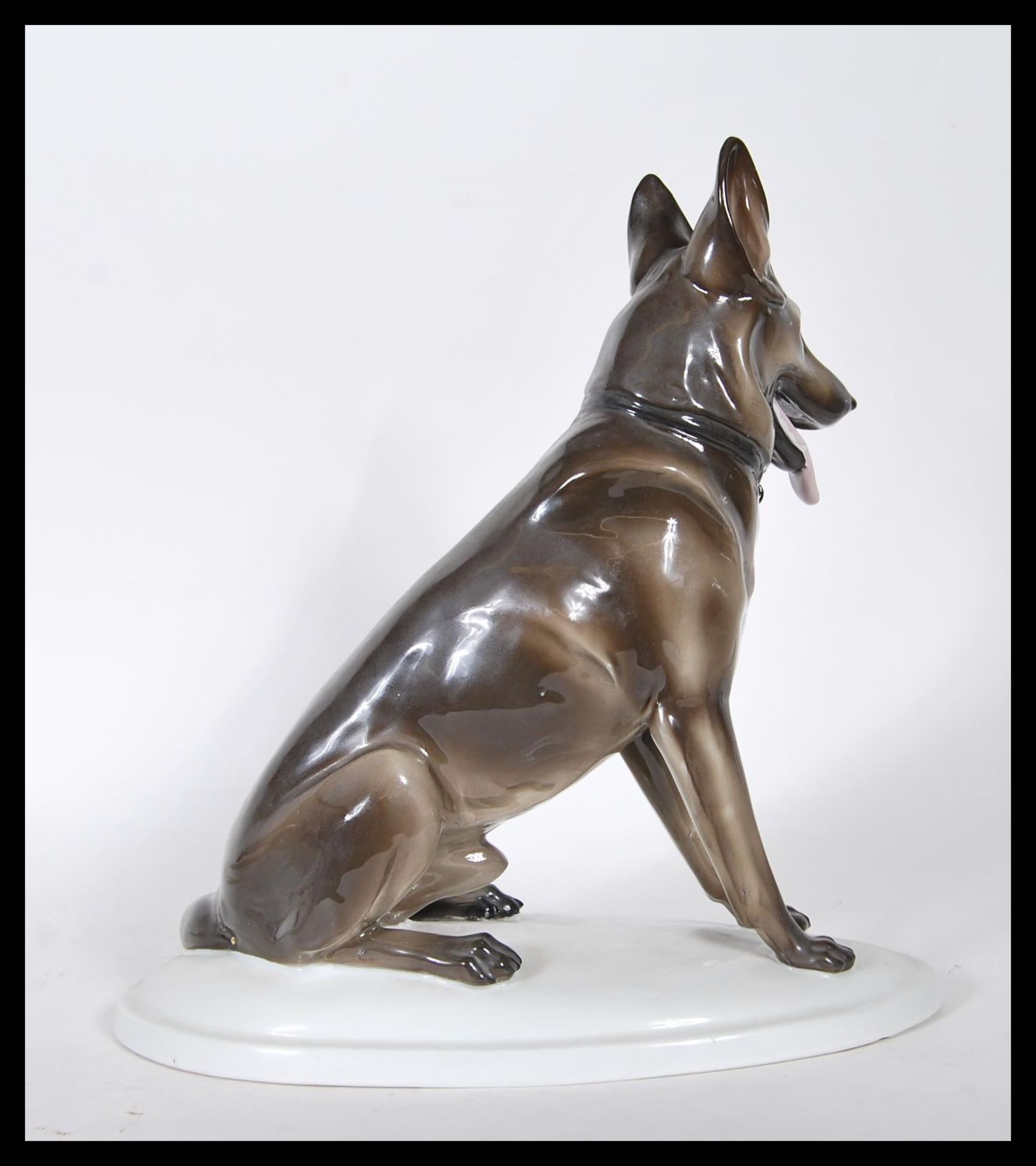 A vintage 20th Century Zsolnay ceramic figurine ( stamped  5566 ) modelled as a seated Alsatian / - Bild 3 aus 6