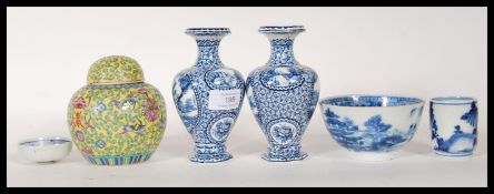 A collection of Oriental ceramics to include a blue and white bowl having hand painted Chinese