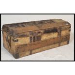 A 19th Century Boar / Pig skin iron bound steamer travel trunk, dome top with iron strap-work (