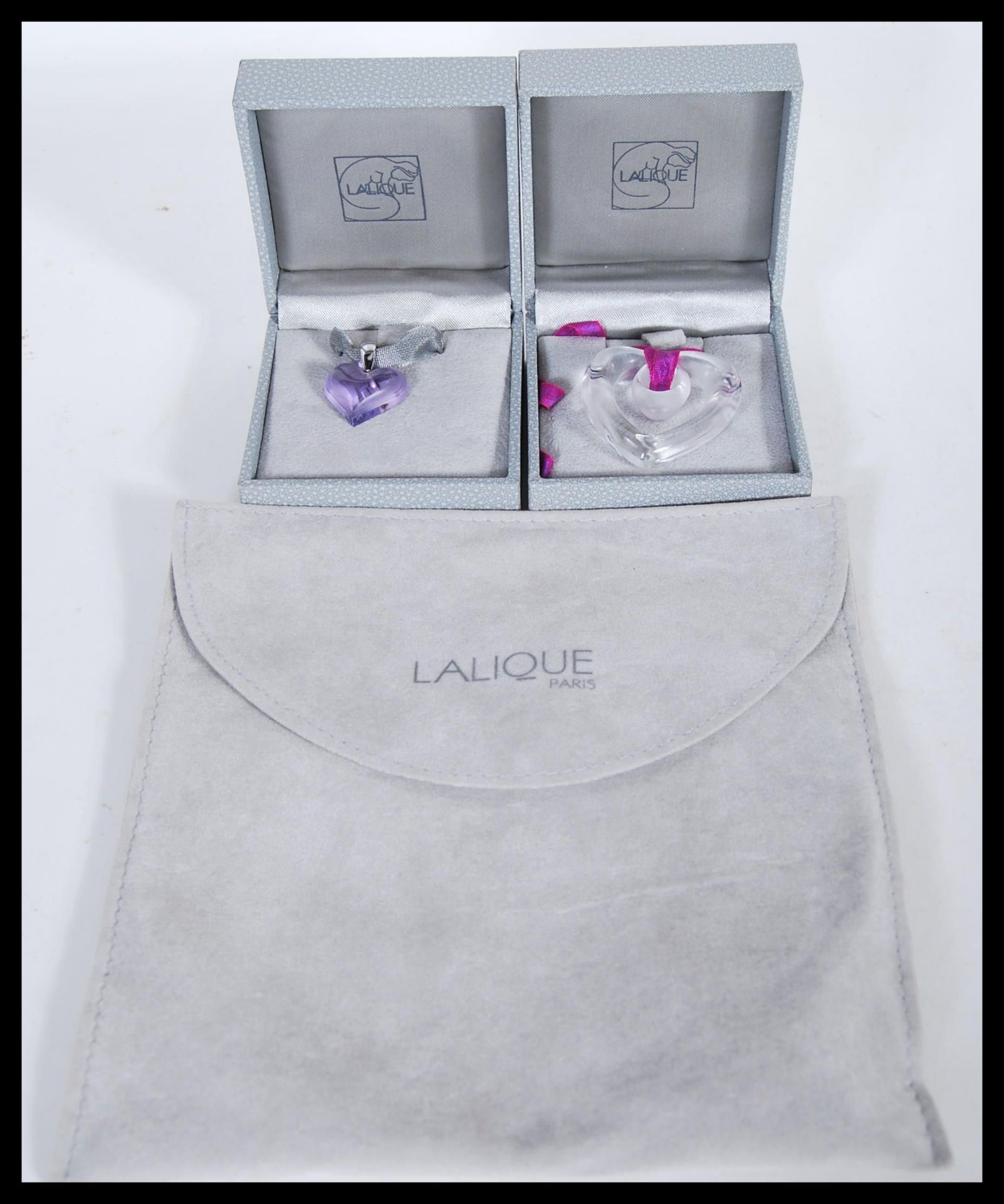 A collection of Lalique silver 925 marked jewellery to include a box clear glass pierced heart