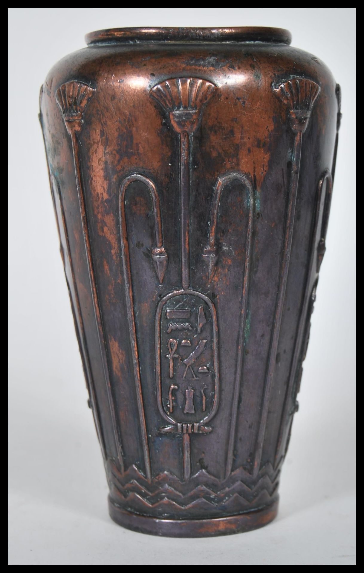 A early 20th century 1920's Japanese Egyptian revival bronze vase of baluster form, having cartouche