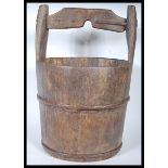 A 19th Century Chinese coopered wooden elm water pail / bucket being of cylindrical form with