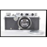 A Leica lll D.P.R Rangefinder chrome camera by Ernst Leitz Wetzlar Germany, Serial number 343924.