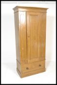 A 19th Century Victorian single bachelors wardrobe with scrumble painted finish, the wardrobe with