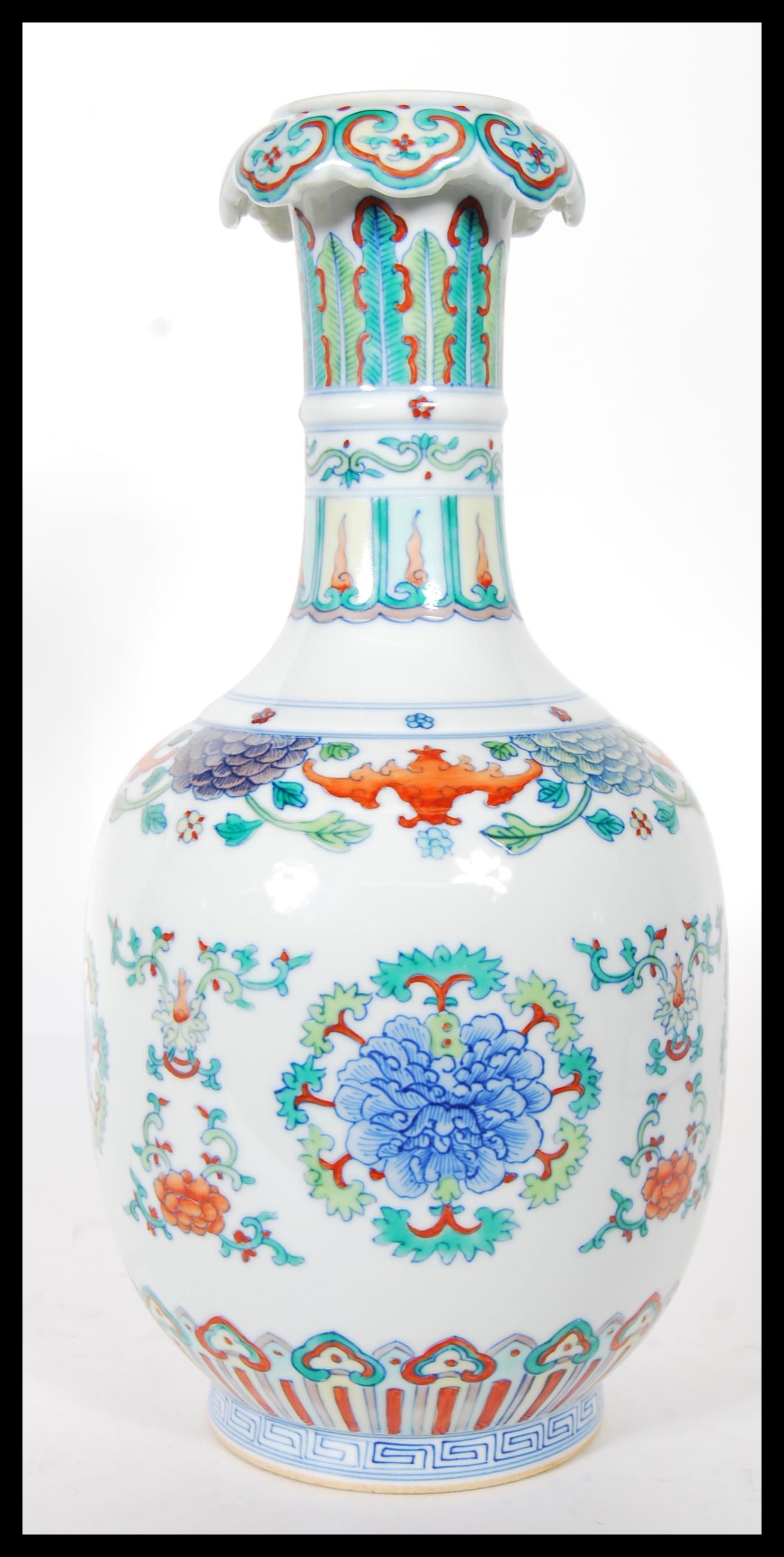 A 20th Century Chinese vase having wasted neck falling into a bulbous body, being Wucai having - Image 2 of 6