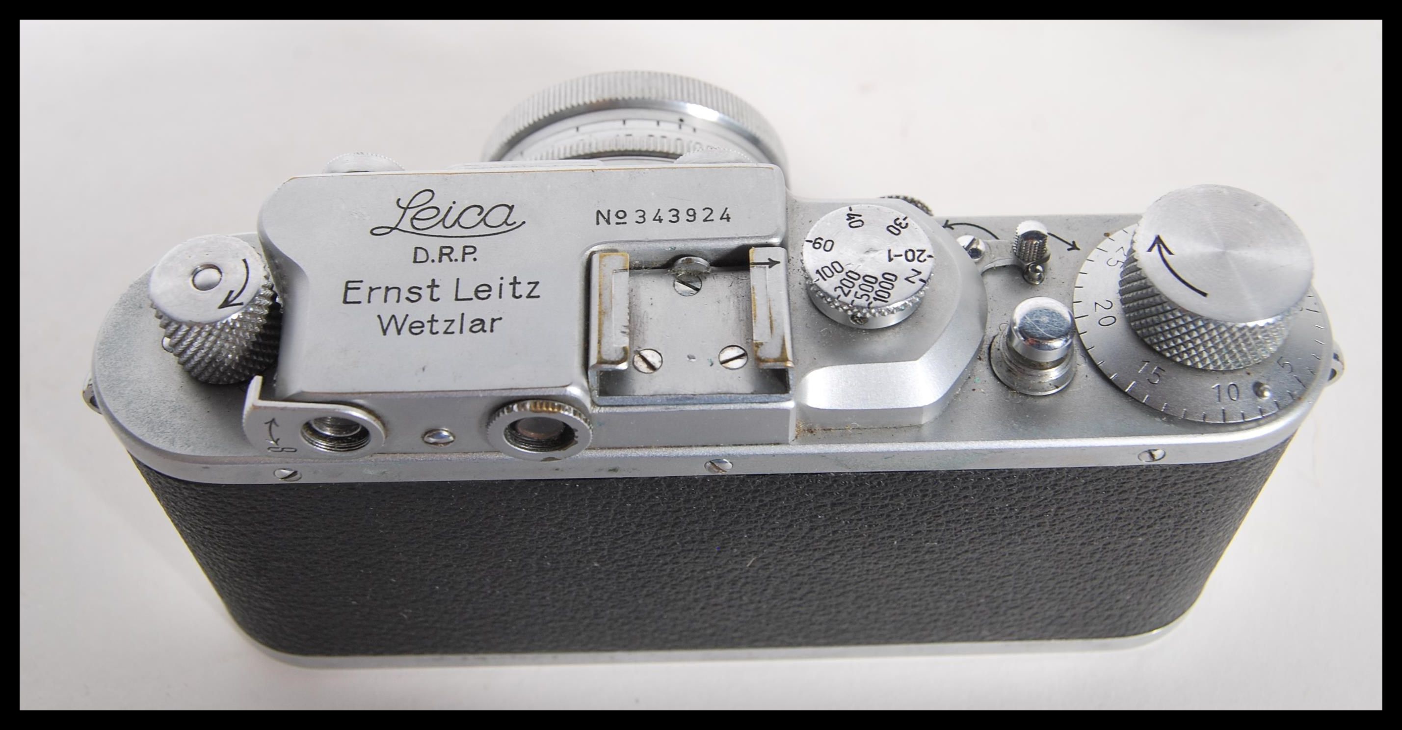 A Leica lll D.P.R Rangefinder chrome camera by Ernst Leitz Wetzlar Germany, Serial number 343924. - Image 4 of 7