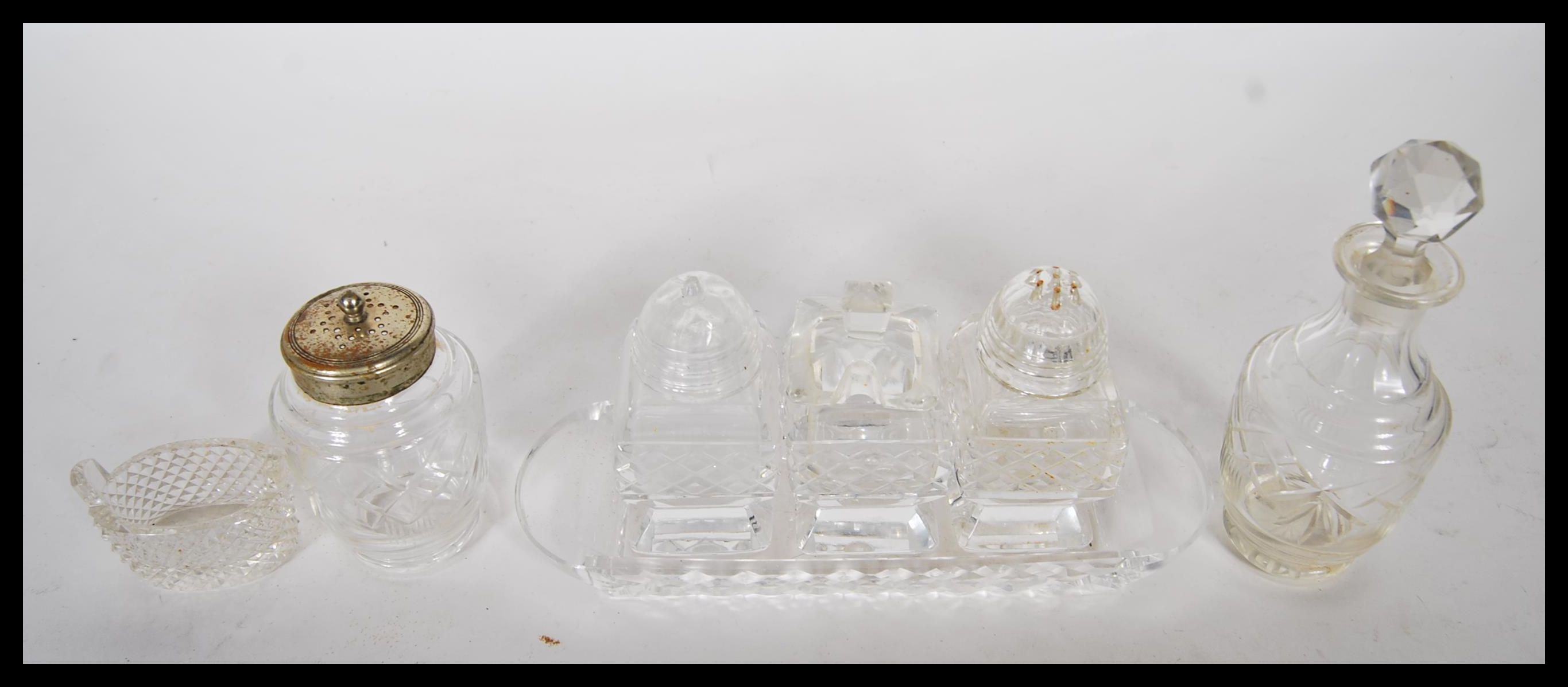 A collection of 20th Century cut glass cruets to include a three part cruet set consisting of - Image 6 of 6