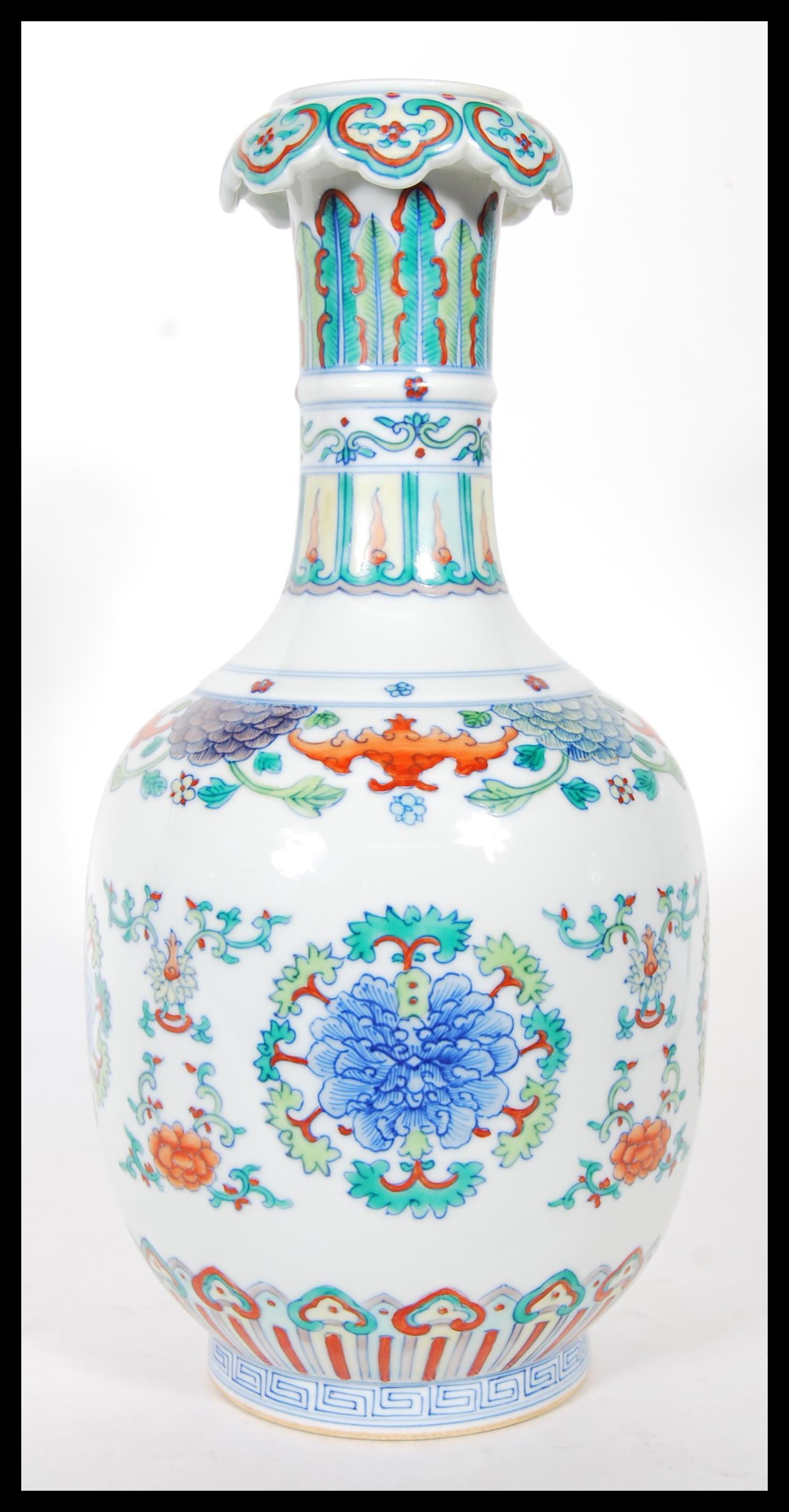 A 20th Century Chinese vase having wasted neck falling into a bulbous body, being Wucai having - Image 4 of 6