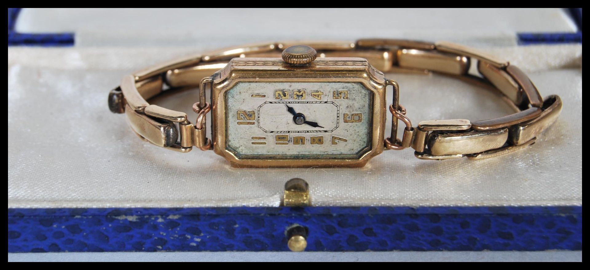 A 9ct gold ladies cocktail watch, enamel face with Arabic numerals, set to a gilt metal expanding - Image 7 of 10