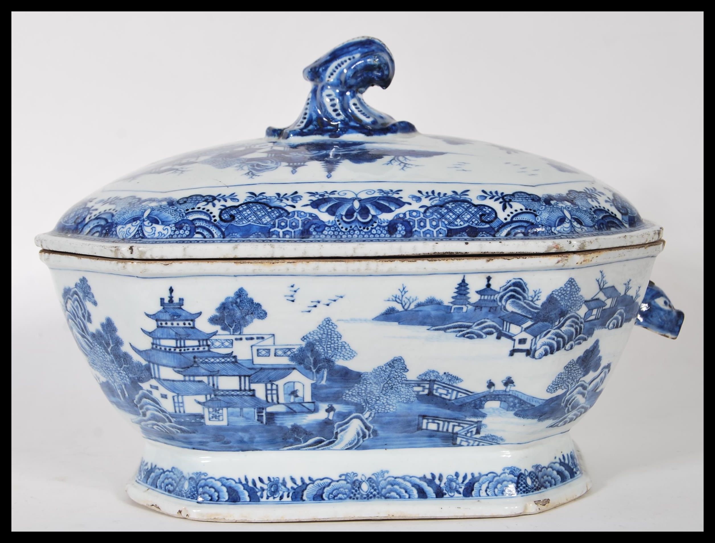 An early 18th century Chinese blue and white large tureen and lid having chinoiserie decoration with