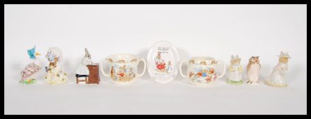 A collection of Beatrix Potter collectable ceramics to include figurines such as Jemima