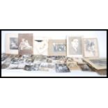A collection of family photographs dating from the late 19th Century, the photographs ranging from