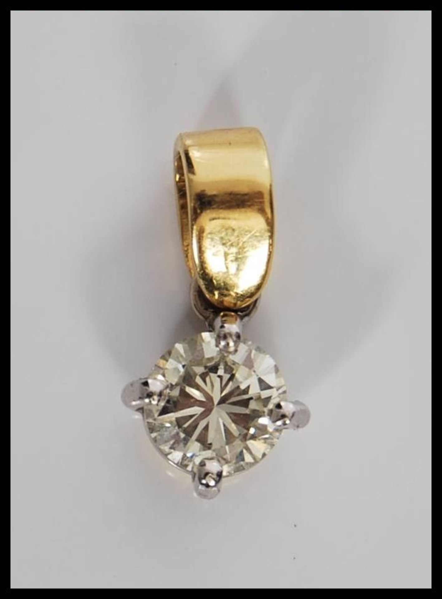 A 20th Century diamond pendant having a hallmarked 18ct gold bale set with a brilliant cut diamond - Bild 2 aus 5