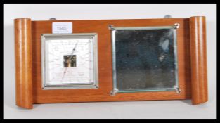 An early 20th Century circa 1930's Art Deco  wall hanging frameless hall barometer and mirror set,