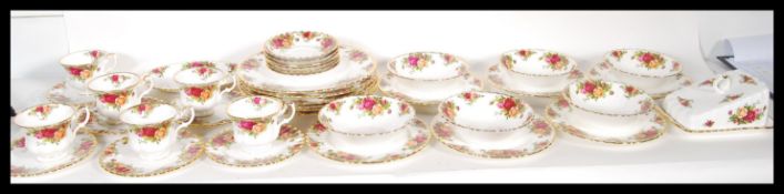 An extensive Royal Albert Old Country Roses dinner / tea service to include tea cups, saucers,