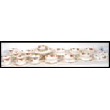 An extensive Royal Albert Old Country Roses dinner / tea service to include tea cups, saucers,