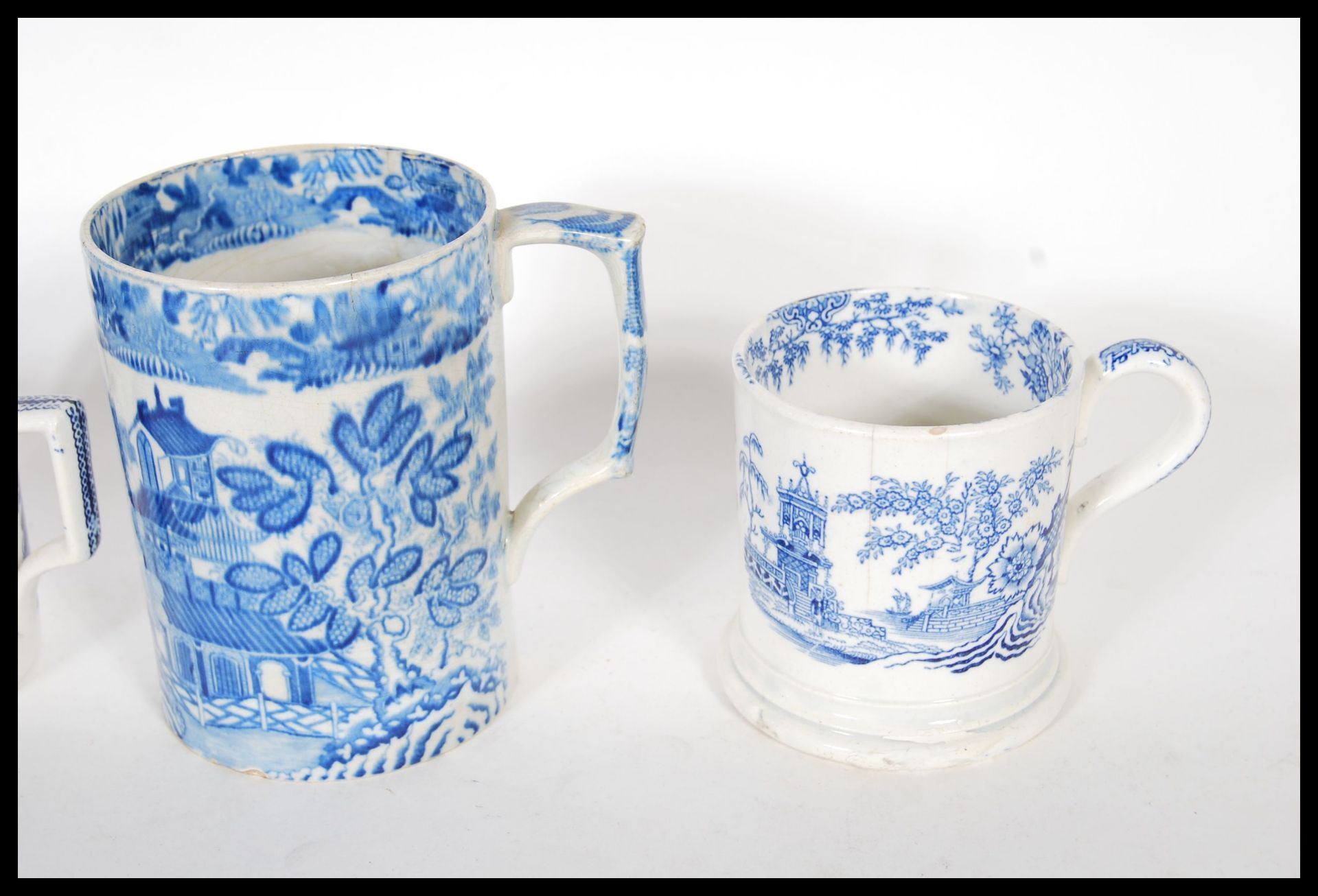 A collection of 19th Century Victorian Staffordshire mugs and cups, most having blue and white - Bild 6 aus 13