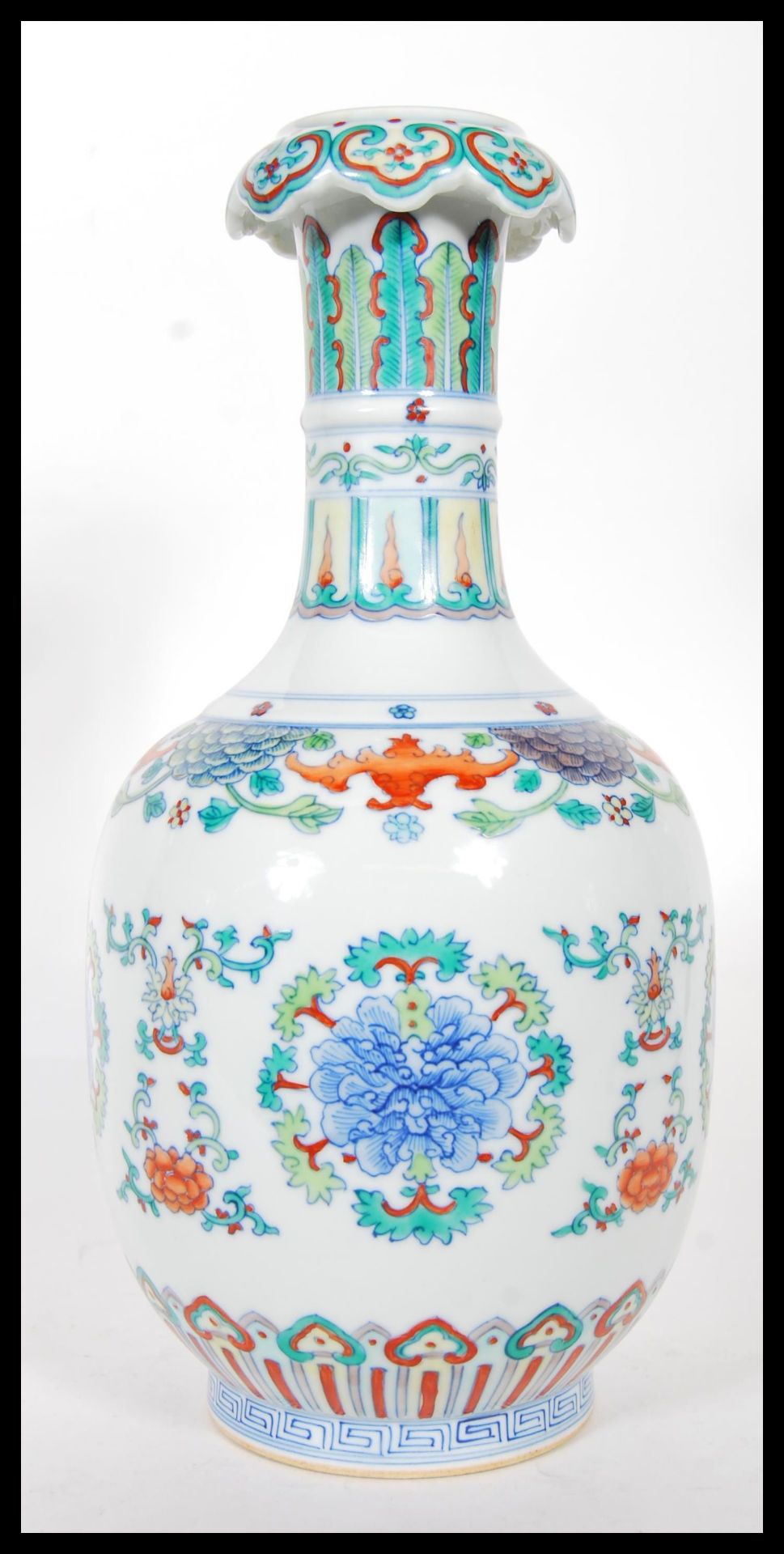 A 20th Century Chinese vase having wasted neck falling into a bulbous body, being Wucai having