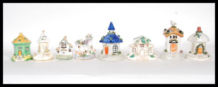 A group of eight 19th Century Victorian Staffordshire ceramic house and cottage pastille burners