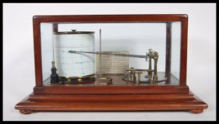A late 19th / early 20th Century, barograph in glazed mahogany case with chart drawer, Retailers