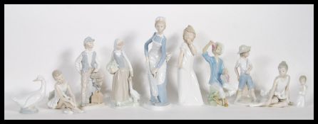 A group of ten 20th Century Spanish Nao ceramic figurines to include: ''So Shy'' , ''Seated Ballet''