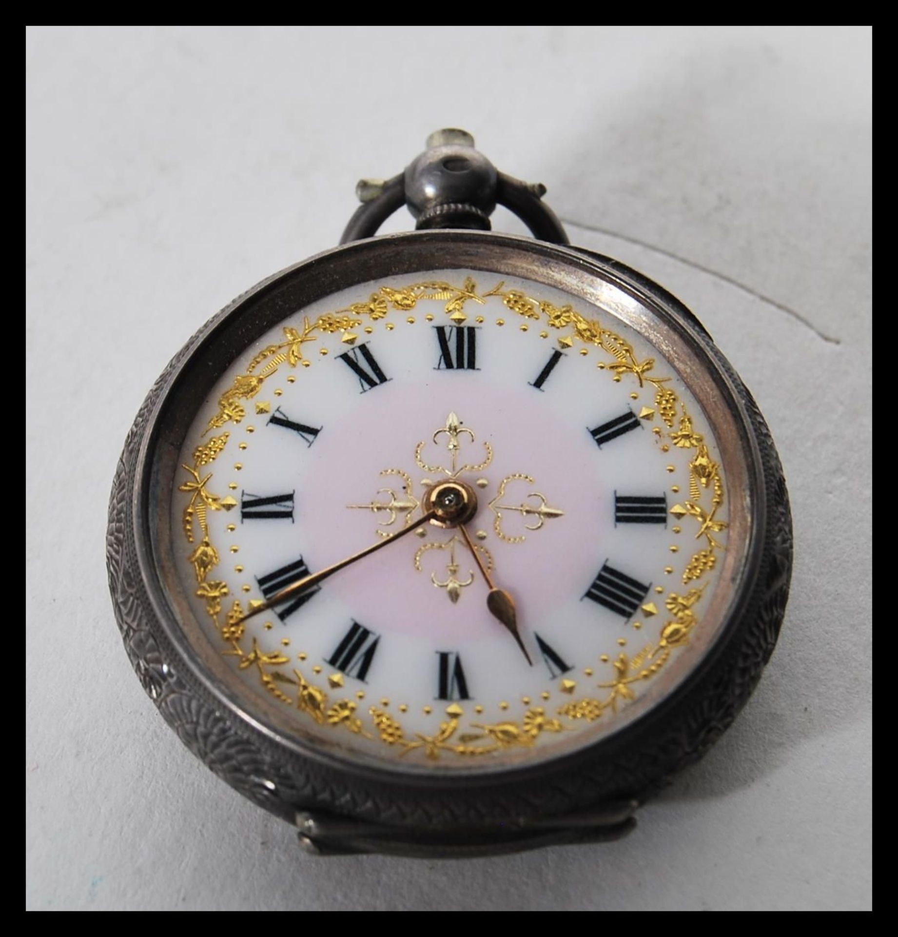 A small hallmarked silver pocket watch, having white enamelled face with roman numerals to the - Image 2 of 8