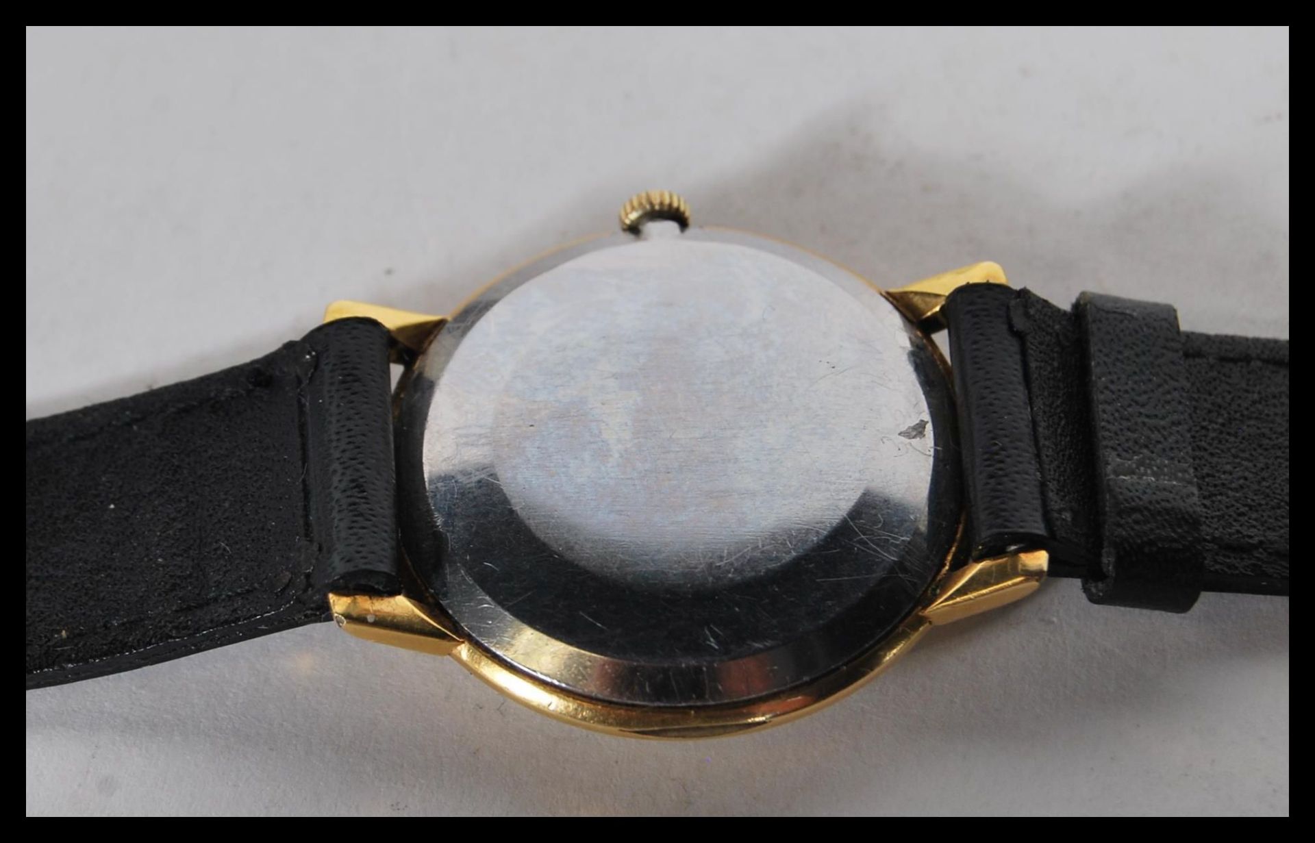 A vintage 20th Century gilt cased Omega mechanical wrist watch, gilt baton markers with a mother - Image 4 of 7
