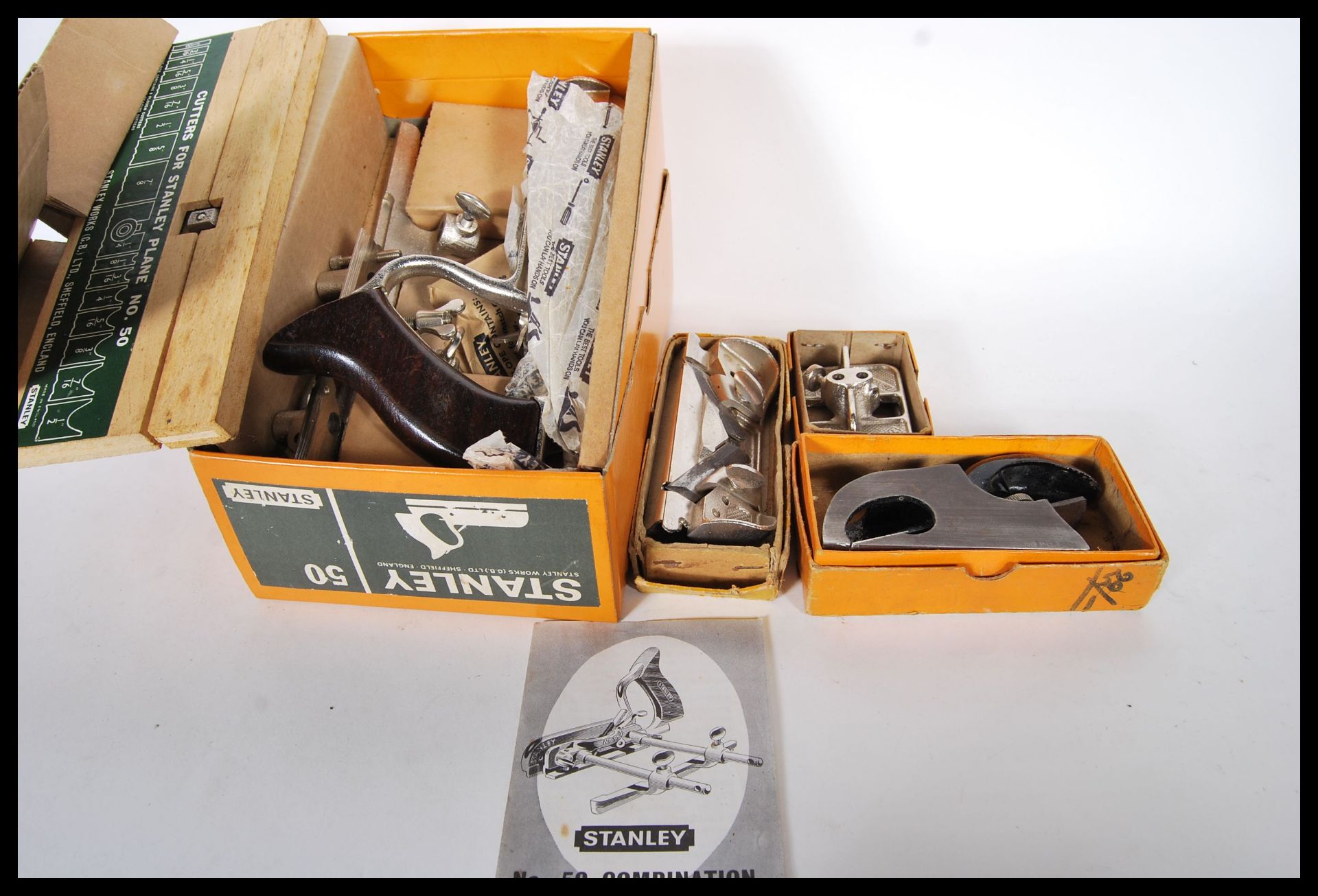 A 20th Century Stanley Combination plane No.50 complete with cutting tools shaving deflector and