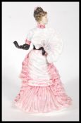 A Royal Doulton ceramic figure inspired by the paintings of Tissot series titled 'L'Ambitieuse'